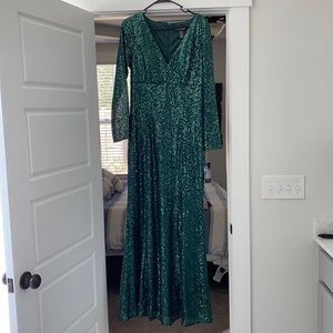 Sequin green long sleeve evening gown.